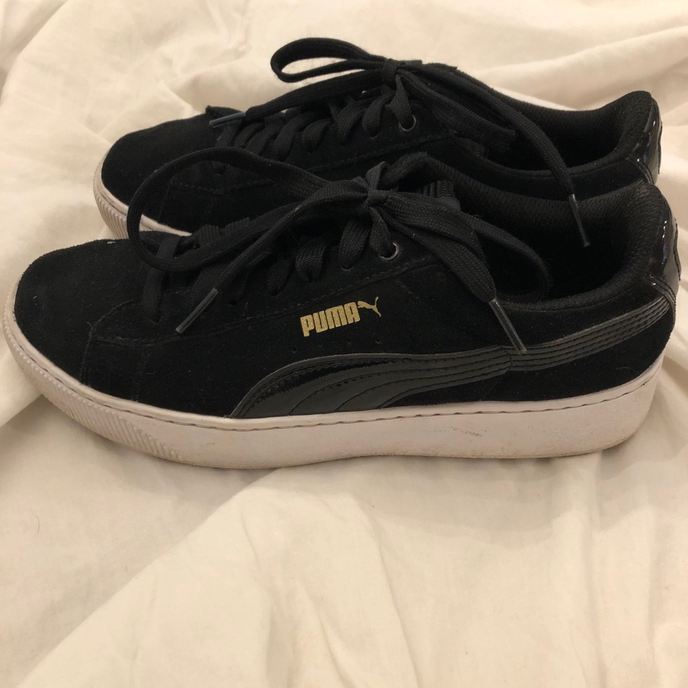 Black suede platform Puma sneakers